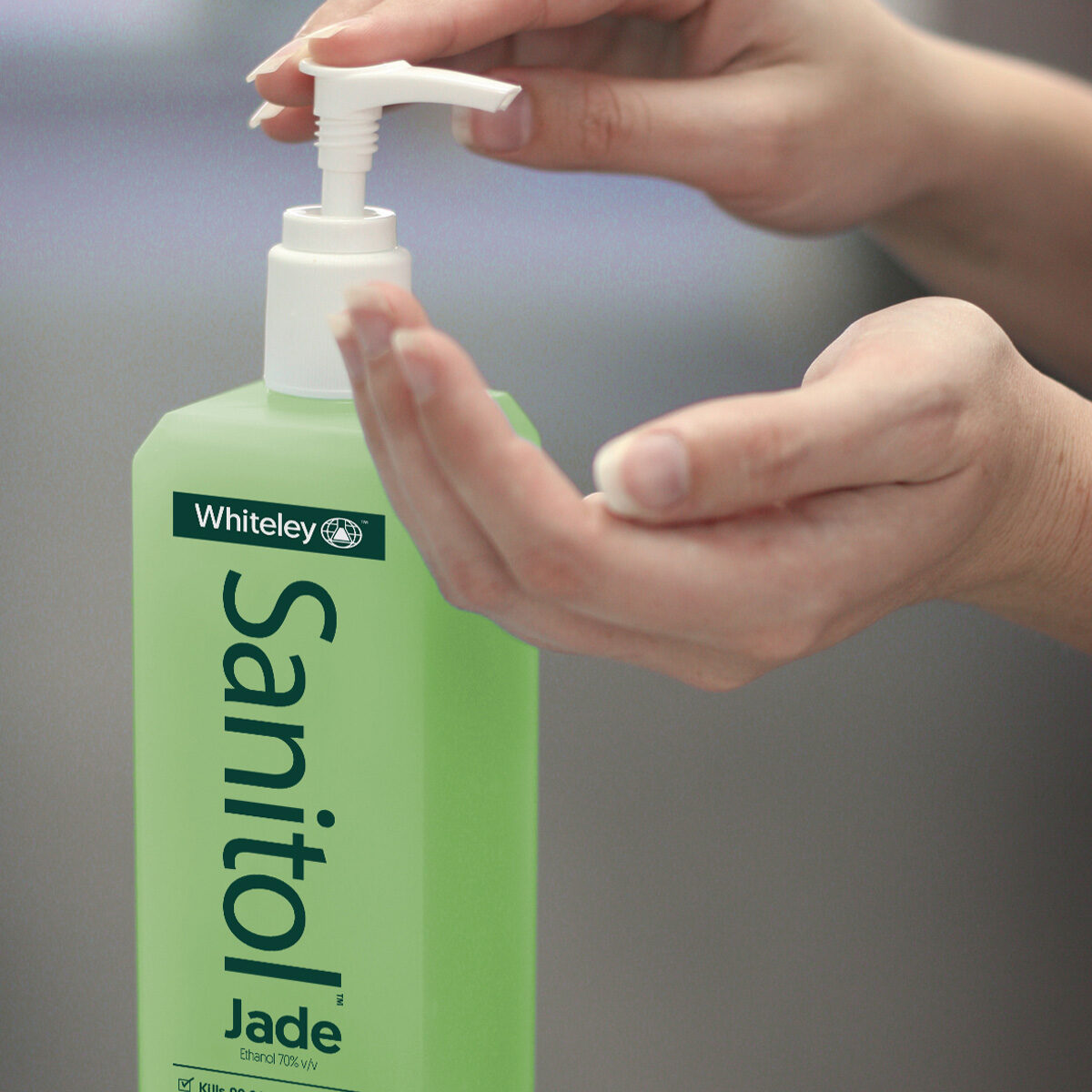Sanitol-Jade-pump-bottle-with-hand-1.jpg
